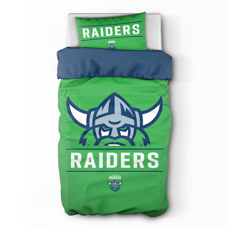 Green and blue quilt cover with 'RAIDERS' branding