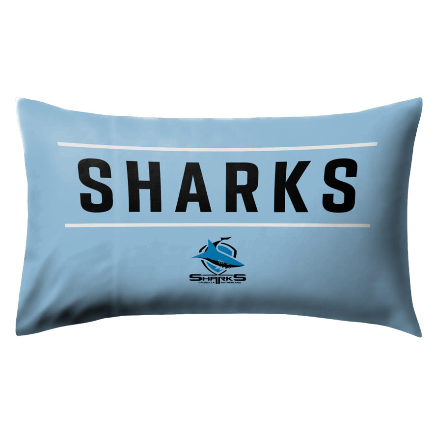 Blue pillow with 'SHARKS' text and logo