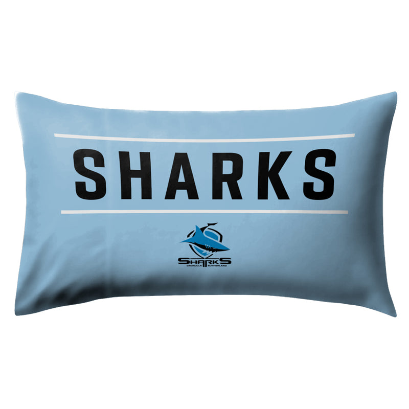 Blue pillow with 'SHARKS' text and logo