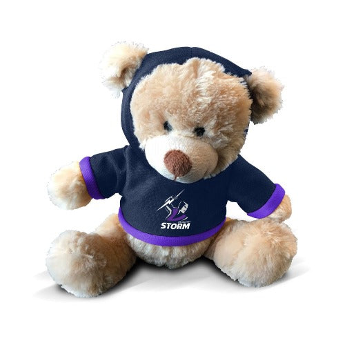 A plush teddy bear wearing a purple hoodie with the Melbourne Storm logo on the front.