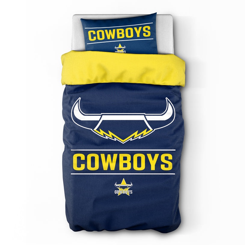 Navy blue and yellow bedding set with 'Cowboys' branding and logo