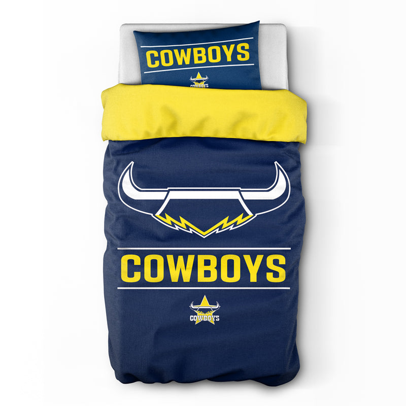 Navy blue and yellow bedding set with 'Cowboys' branding and logo