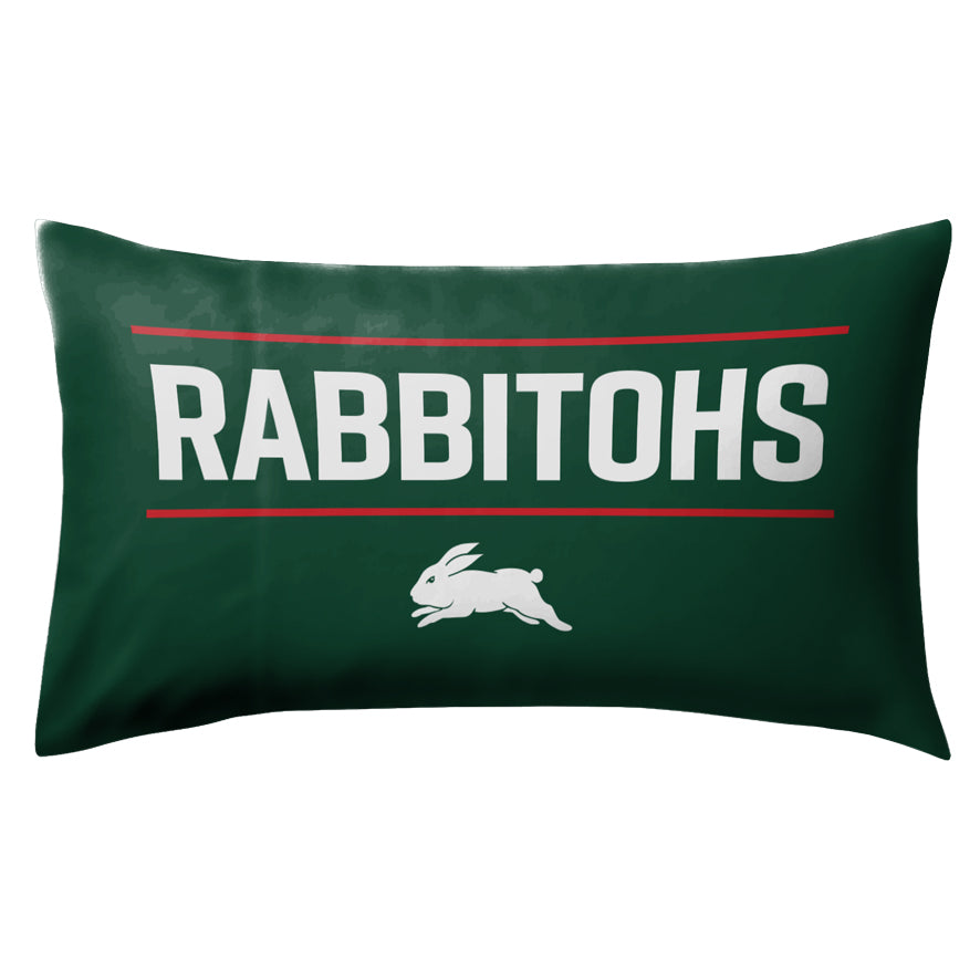 Green pillow with 'Rabbitohs' text and logo