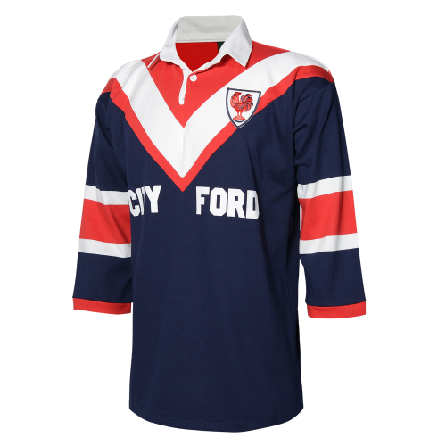 A Sydney Roosters 1976 retro jersey featuring a red and white v-neck design with a blue chest area, and the text 'CITY FORD' printed across the front.