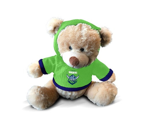 A plush teddy bear wearing a hoodie with the Canberra Raiders logo.