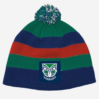 A striped knit beanie for babies or toddlers with a pom-pom on top, featuring red, green, and blue colors, and a Warriors emblem on the front.