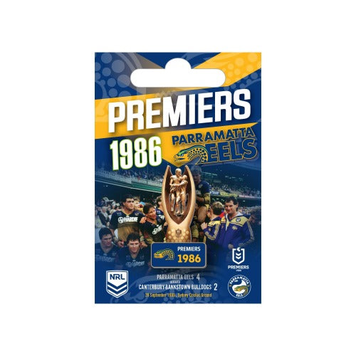 A 3D trophy pin depicting the Parramatta Eels 1986 Premiership, with a blue and yellow design, featuring images of players and the trophy.
